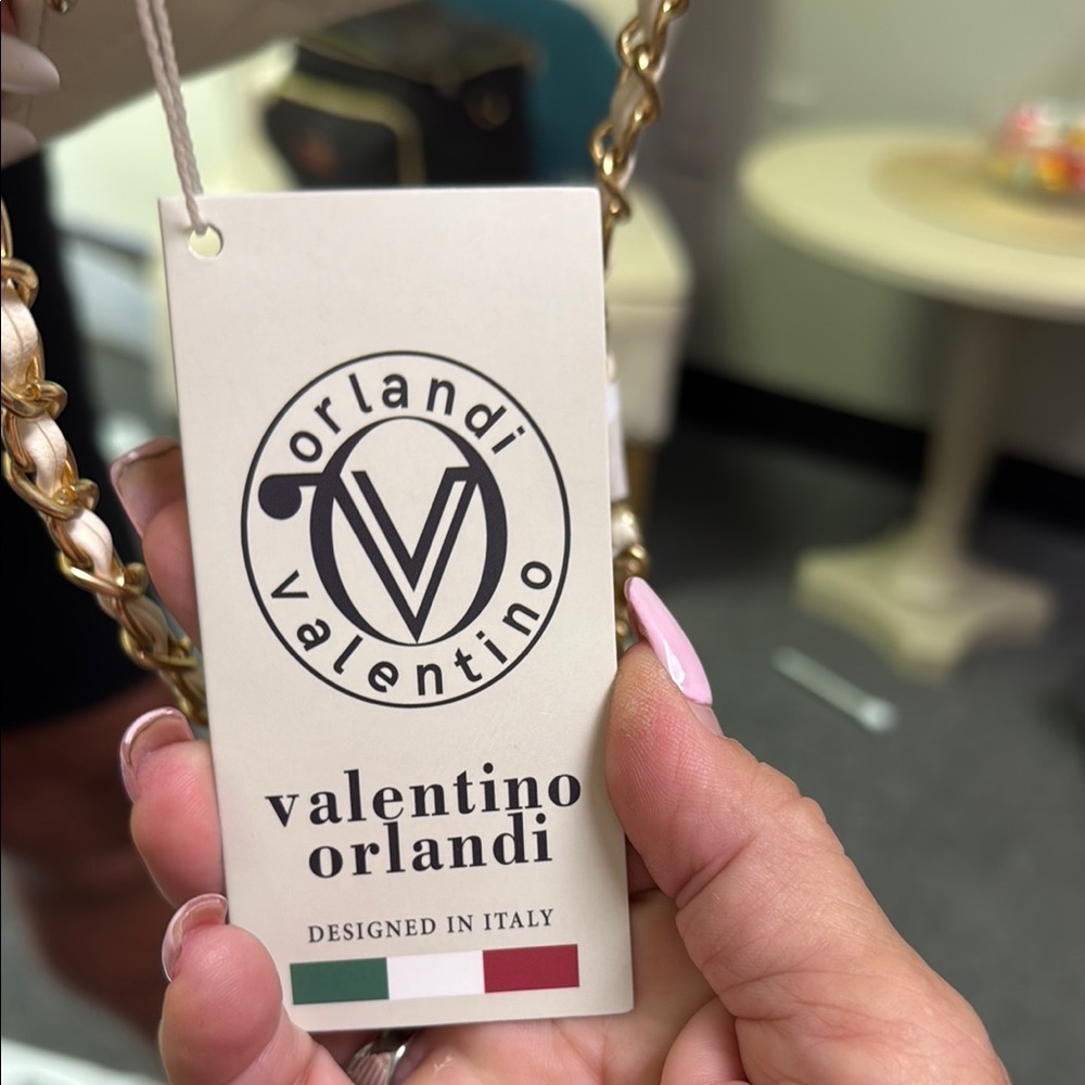 Valentino Orlandi Cream and Gold Mini Bag with Quilted Design
$99.00 TODAY ONLY - Picture 6 of 14